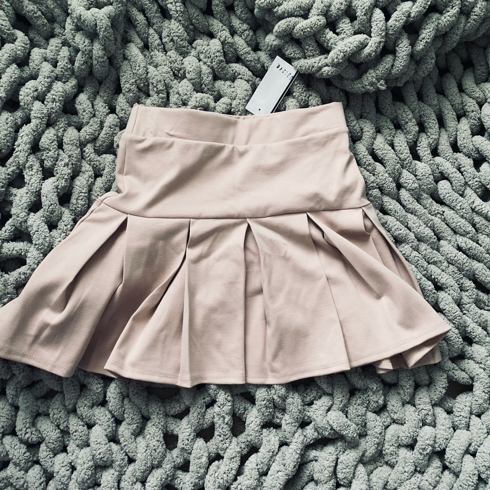 light pink pleated skirt